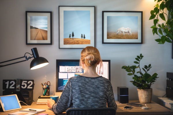 Employee working on project management in her home office