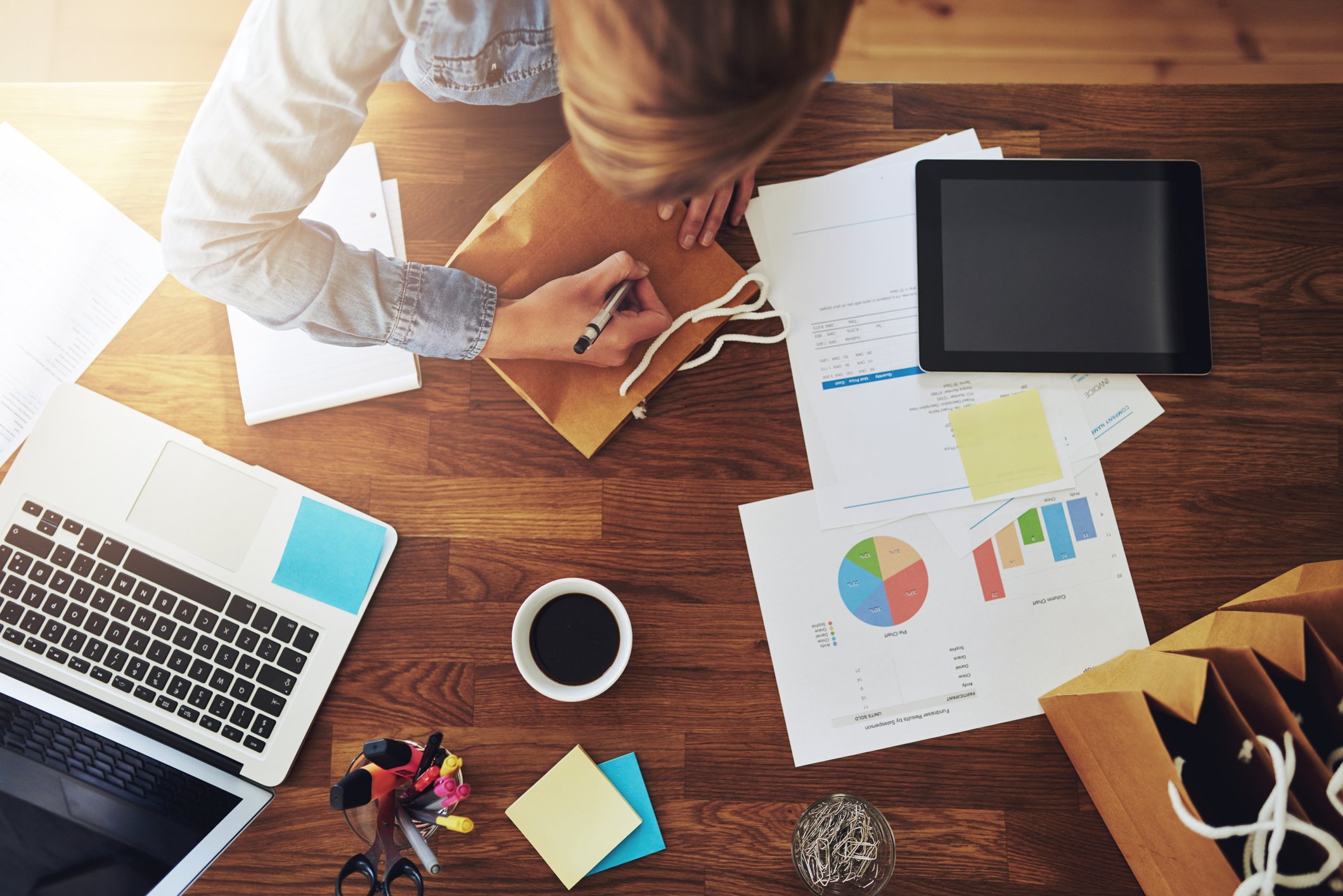 Female Business Owner Working at Desk